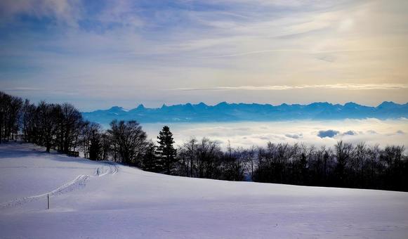 雪とアルプスの写真