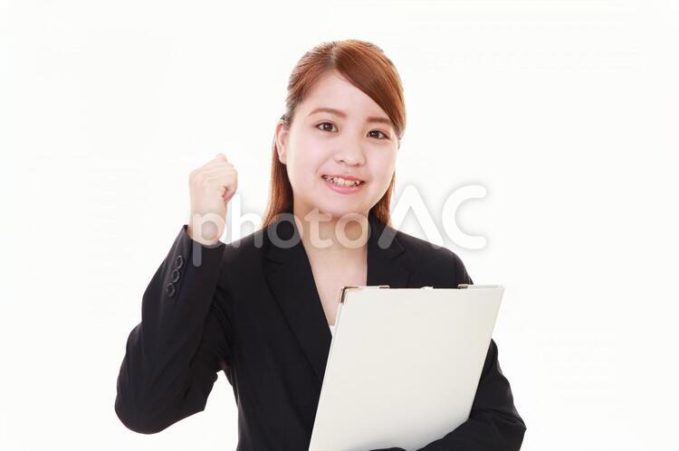 ガッツポーズのビジネスウーマン 女性,ビジネスウーマン,女の写真素材