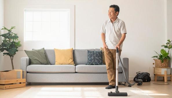 掃除をするミドルの日本人男性の写真