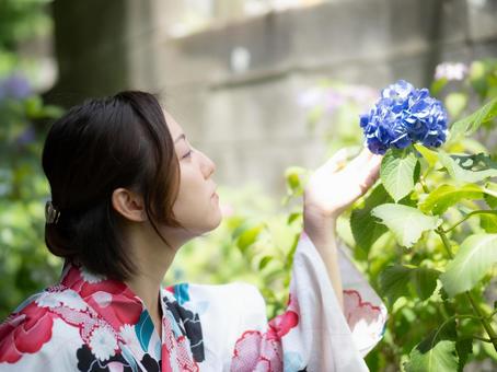 32: A woman in a yukata looking at hydrangeas, JPG 32: A woman in a yukata looking at hydrangeas, JPG