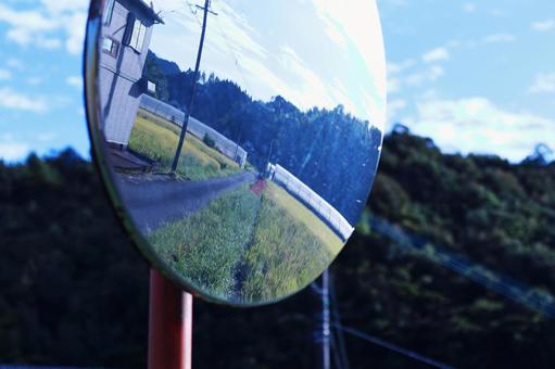 Rural landscape reflected in the mirror, JPG