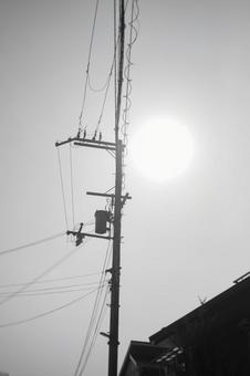 Dazzling sun, electric pole, JPG