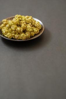 Matcha popcorn on a simple black background, JPG