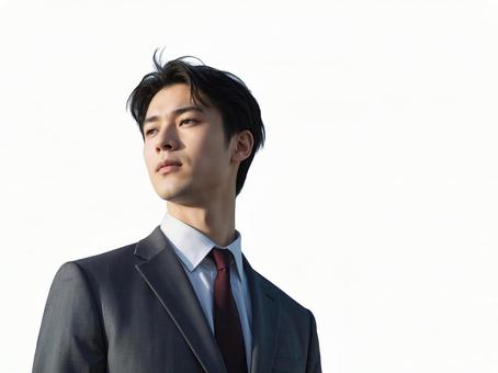 希望に満ちたビジネスマンの若い男性 希望に満ちたビジネスマンの若い男性の写真