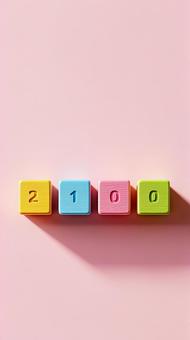 ピンク背景に並んだ2100年木製ブロック ピンク背景に並んだ2100年木製ブロックの写真