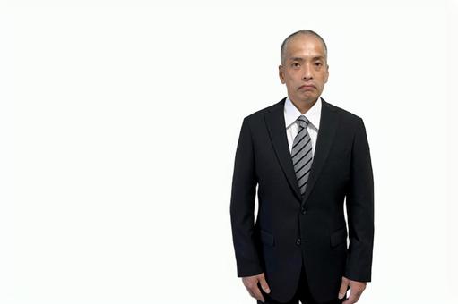 ムッとして反抗的な態度のスーツの中年男性 ムッとして反抗的な態度のスーツの中年男性 スーツ,男性,ビジネスの写真素材