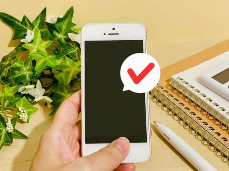 スマホから決済する スマホから決済する スマホ,チェック,マークの写真素材
