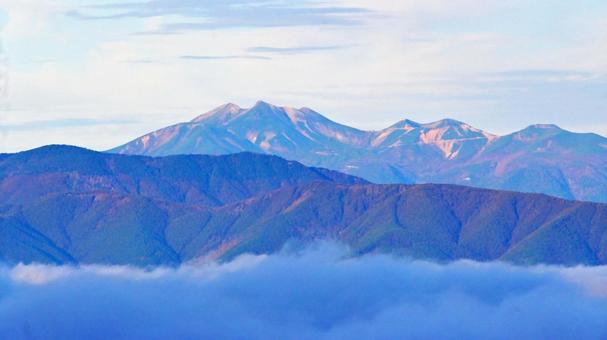 高ボッチ高原から望む早朝の乗鞍岳 乗鞍岳,北アルプス,連峰の写真素材