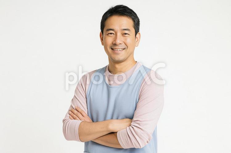落ち着いた笑顔の日本人保育士男性 保育士,男性,笑顔の写真素材