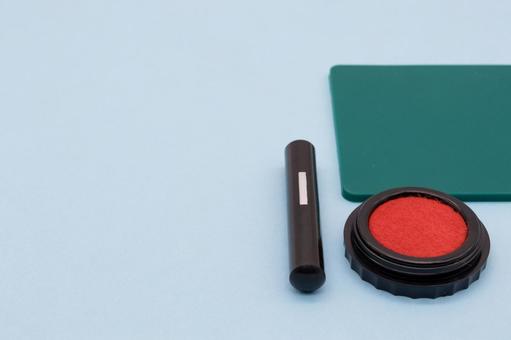水色の背景に印鑑、朱肉、捺印マット 印鑑,認印,朱肉の写真素材