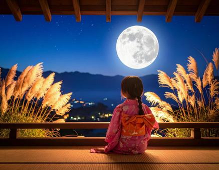 七夕の夜、月を見上げる浴衣の少女 七夕の夜、月を見上げる浴衣の少女の写真