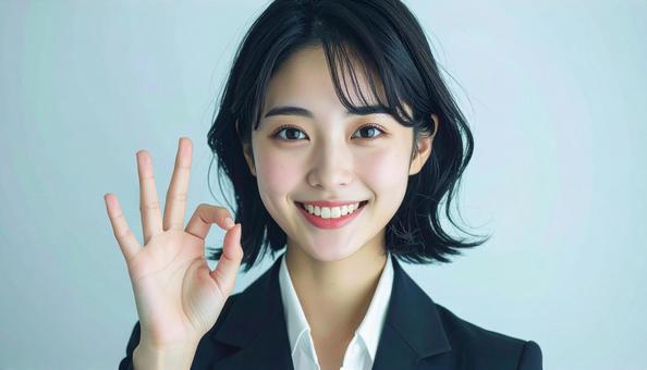OKサインをする女性 OKサインをする女性の写真