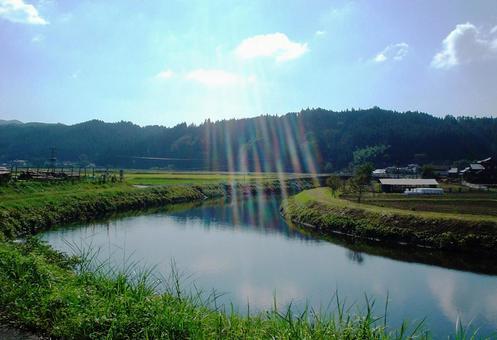 Landscape of rural town where light falls down Landscape of rural town where light falls down