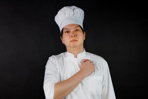 真剣な料理人のポートレート 真剣な料理人のポートレートの写真