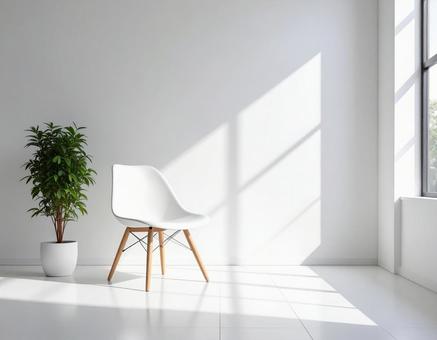 白い椅子と観葉植物の明るい部屋の写真