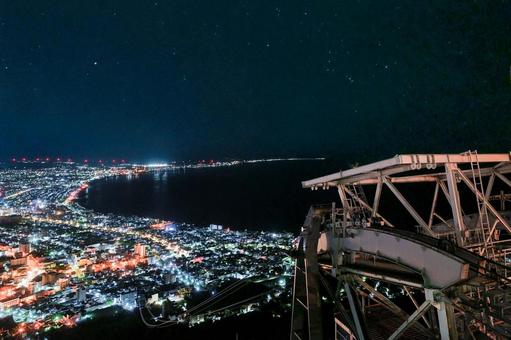 オリオン座と夜景 オリオン座と夜景 夜景,観光,観光地の写真素材