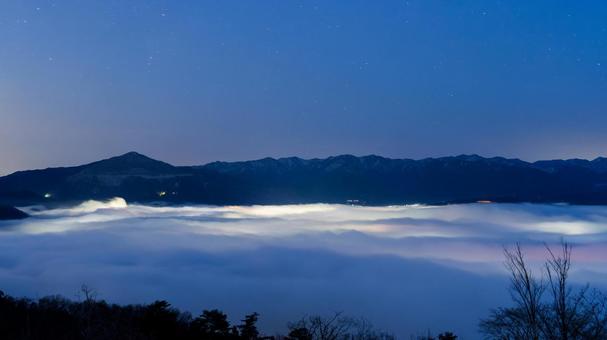 Sea of clouds at Minoyama Park illuminated by city lights, JPG