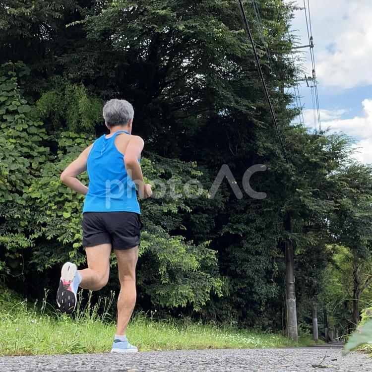 レースに向けて走り込む男性 男性,男,走るの写真素材