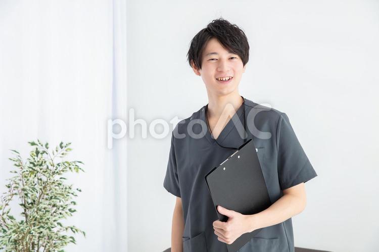 笑顔のカメラ目線の看護師　doctor 作業療法士,リハビリ,介護士の写真素材