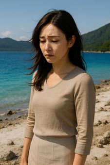 悲しみを抱えた女性の写真