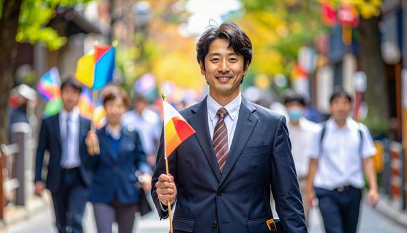 旗を持って旅行客を導く男性の旅行添乗員 旗を持って旅行客を導く男性の旅行添乗員の写真