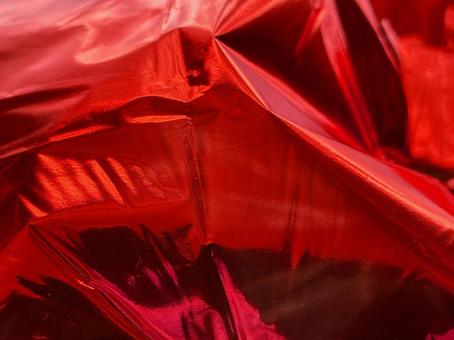 メタリックレッド背景の写真