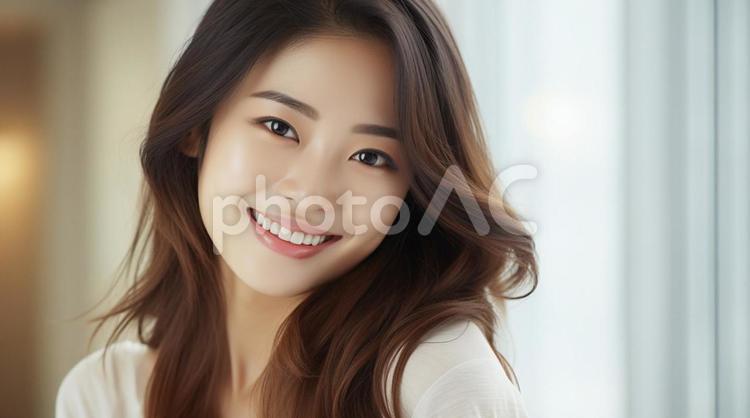 キレイな笑顔の女性の顔アップ 女性,美容,beautyの写真素材
