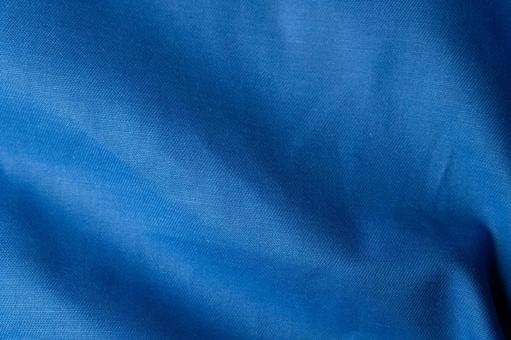 ブルー生地のシワテクスチャの写真