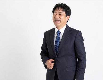 笑うビジネスマン 笑うビジネスマンの写真