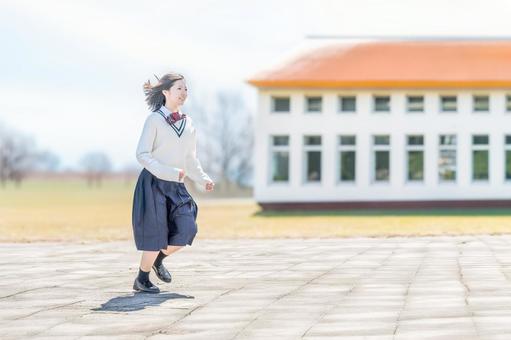 校舎を走る生徒 女子生徒,学生,制服の写真素材