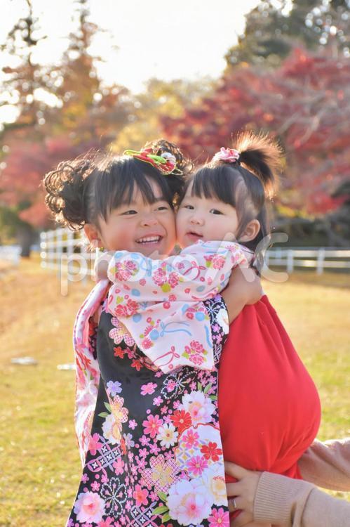 七五三の女の子と赤ちゃん お着物,お祝い,お祝いごとの写真素材