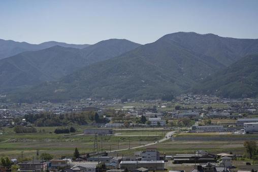 高台から見た春の長野県上伊那郡辰野町 高台から見た春の長野県上伊那郡辰野町 辰野町,箕輪町,上伊那の写真素材