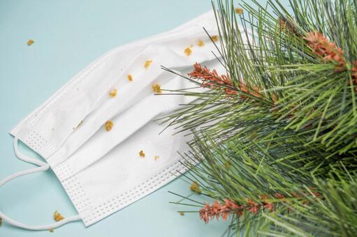 白いマスクと飛散した花粉のイメージ背景 マスク,花粉,花粉症の写真素材