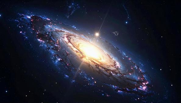 輝く渦巻銀河の中心光 輝く渦巻銀河の中心光の写真