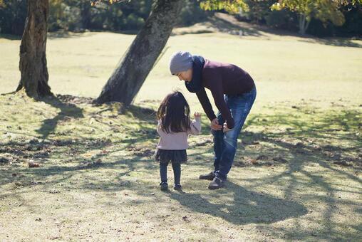 Parents and children playing in the park, autumn, daughter, two year old, JPG