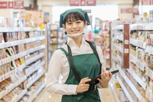 スーパーで働く人々 スーパーで働く人々 スーパー,スーパーマーケット,女性の写真素材