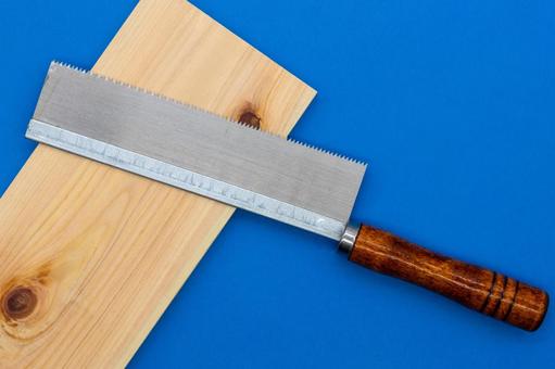 Saw and plank on a blue background, JPG Saw and plank on a blue background, JPG