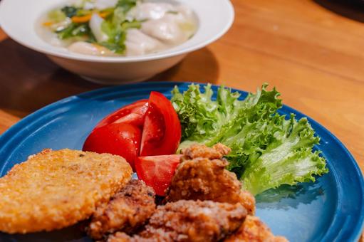 A hearty dinner of boiled dumplings and fried chicken, JPG