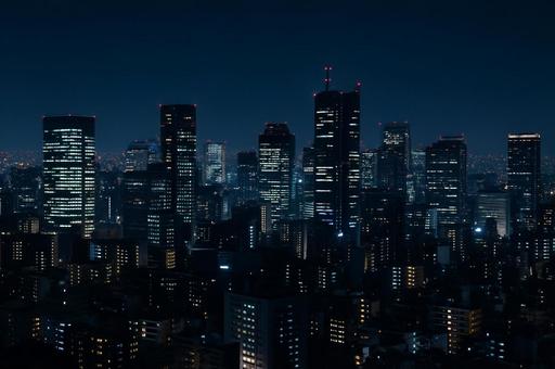 高層ビルが輝く夜の都市風景の写真