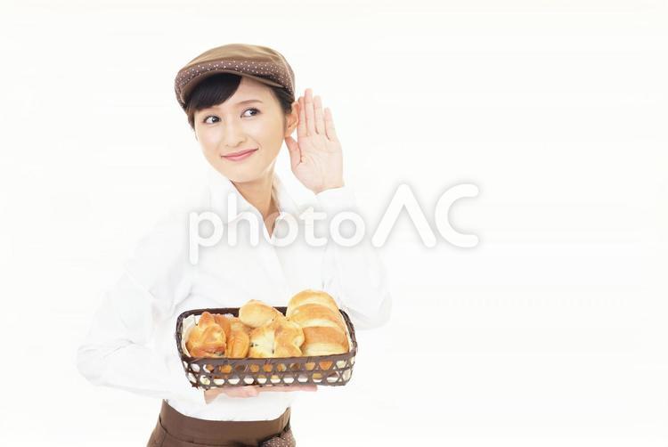 耳に手を当てるウエイトレス 女性,食べ物,ビジネスの写真素材