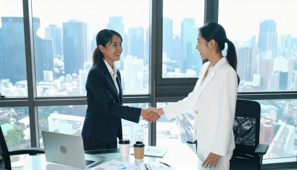 握手するビジネスパーソンの写真