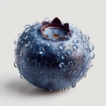 白背景に映えるブルーベリーと水滴 白背景に映えるブルーベリーと水滴の写真