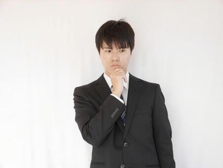 20's man businessman think 20's man businessman think