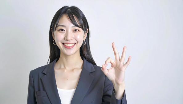 OKサインをする女性 OKサインをする女性の写真