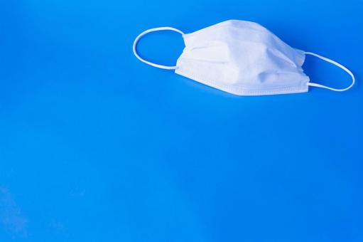 Simple mask on blue background, JPG Simple mask on blue background, JPG
