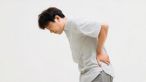 腰痛に苦しむ姿 腰痛に苦しむ姿の写真