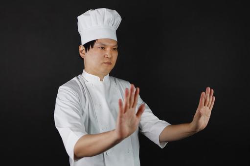 制止するシェフ 制止するシェフの写真