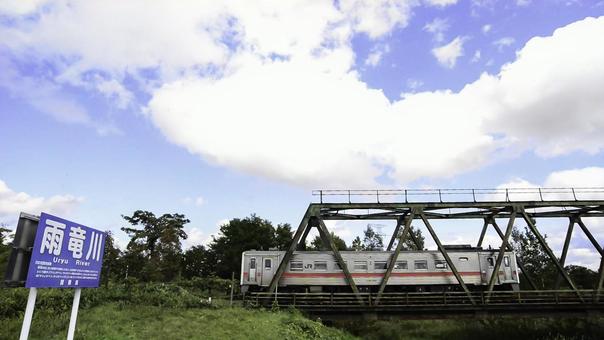 雨竜川を渡る留萌線の写真