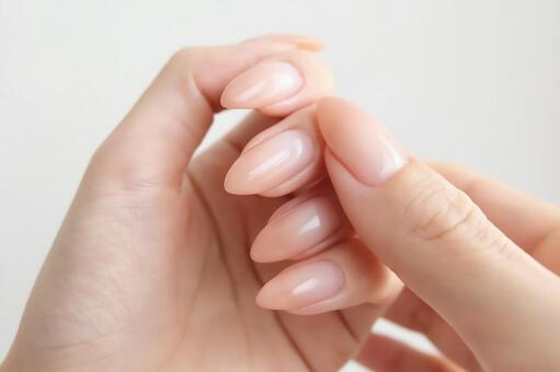 ネイルオイルをぬる ネイル,ネイルケア,nailの写真素材