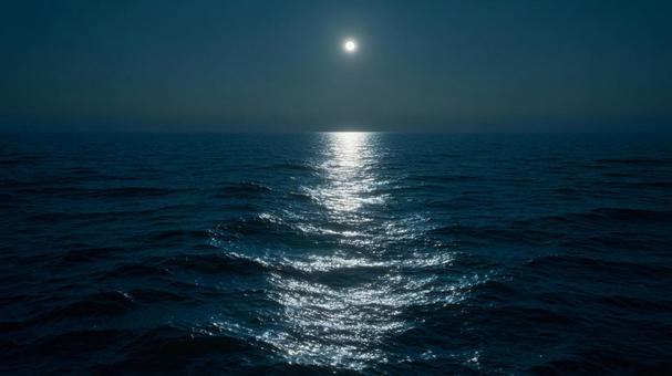 夜空に輝く満月と、水面に映る幻想的な月光 夜空に輝く満月と、水面に映る幻想的な月光の写真